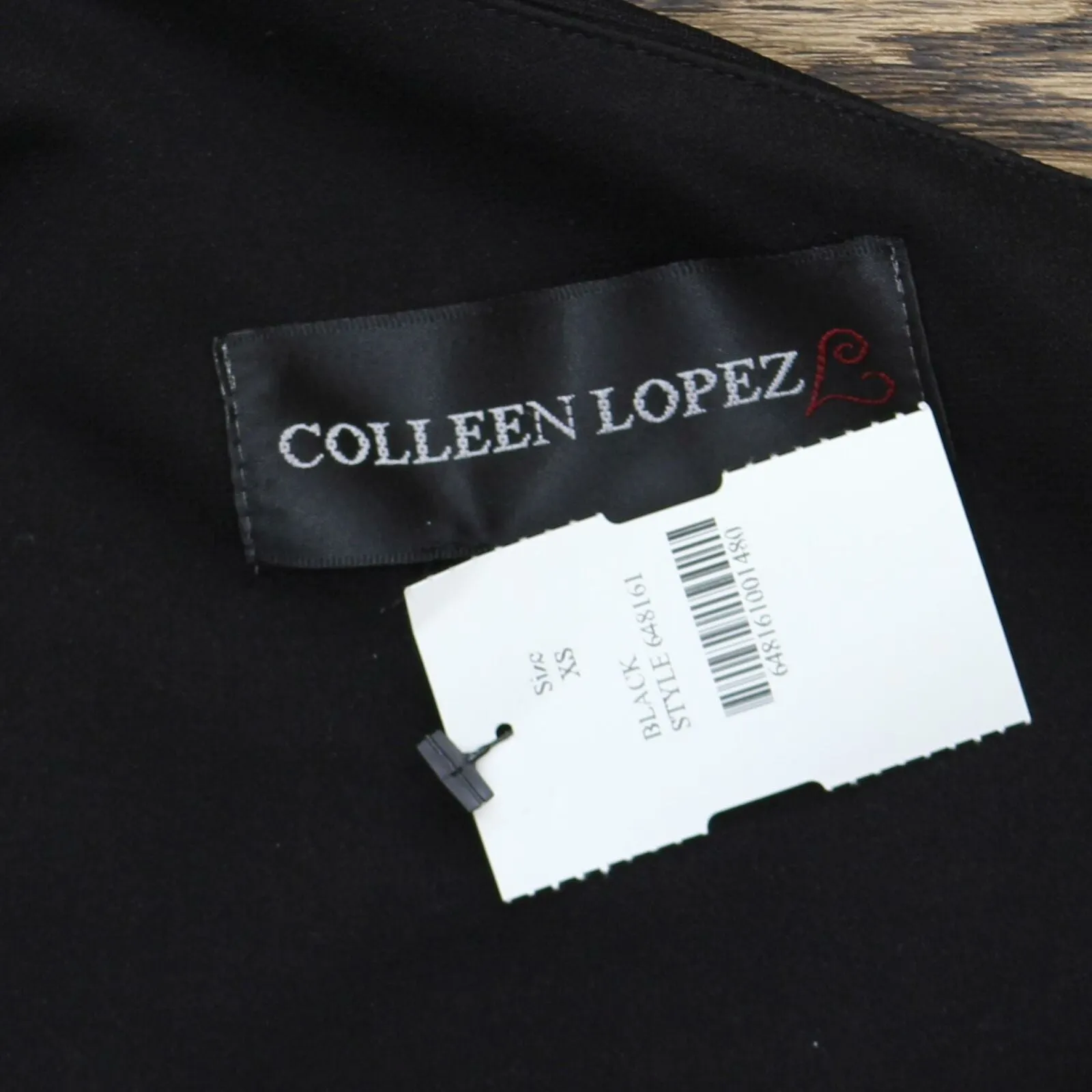 Colleen Lopez Women's Asymmetric Off-Shoulder Flounce Top