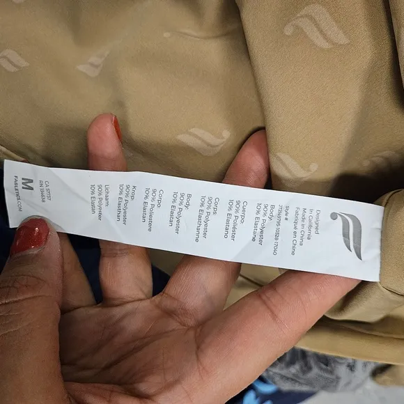 Fabletics windbreaker pull over neutral tan creme logo jacket hooded athletic M