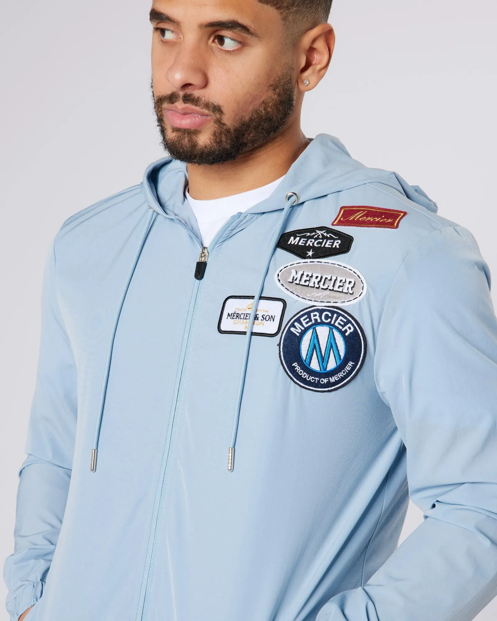 Sky Blue OG Badge Windbreaker